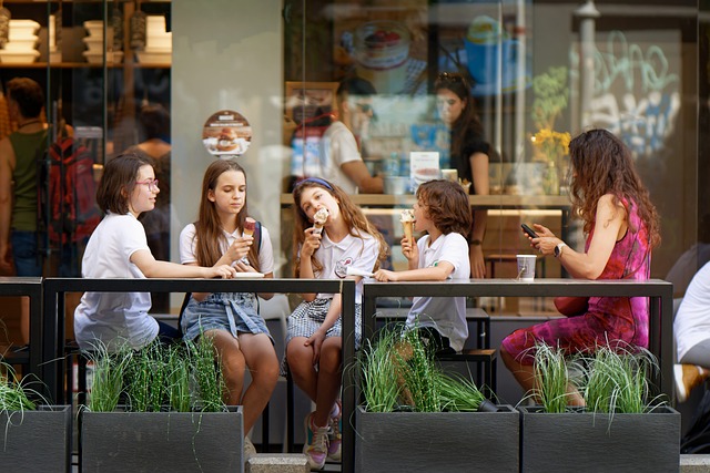 Girls have ice cream at an ice cream parlor